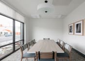 Thumbnail 10 of 22 - a conference room with a long wooden table and chairs at QUINN BY VINTAGE, Shoreline