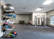 Thumbnail 16 of 22 - a large fitness room with weights and other exercise equipment at QUINN BY VINTAGE, Washington