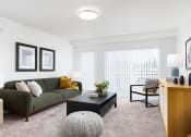 Thumbnail 19 of 22 - a living room with white walls and carpet at QUINN BY VINTAGE, Shoreline, Washington