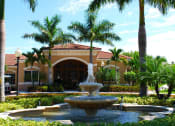 Thumbnail 5 of 15 - Renaissance community exterior with palm trees and fountain at Renaissance, West Palm Beach, Florida