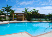 Thumbnail 6 of 15 - Renaissance resort style swimming pool with chairs and umbrellas at Renaissance, Florida, 33409