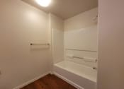 Thumbnail 17 of 21 - large bathroom with tub at DOVER WOODS SENIOR APARTMENTS, California