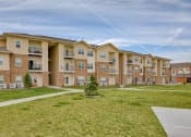 Thumbnail 48 of 48 - Exterior community buildings with grass at Salish Flats APARTMENTS, Airway Heights, WA