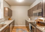 Thumbnail 3 of 48 - kitchen for the 2x2 floor plan at Salish Flats APARTMENTS, Washington