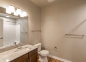 Thumbnail 19 of 48 - image of bathroom with single sink and toilet at Salish Flats APARTMENTS, Airway Heights, WA