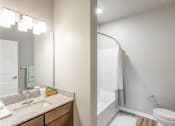 Thumbnail 9 of 48 - bathroom with tub and sink at Salish Flats APARTMENTS, Airway Heights