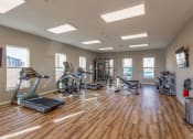 Thumbnail 27 of 48 - fitness center with treadmill and elliplticals at Salish Flats APARTMENTS, Airway Heights, WA 99001