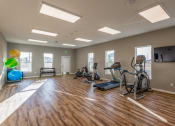 Thumbnail 28 of 48 - gym with cardio equipment at Salish Flats APARTMENTS, Airway Heights