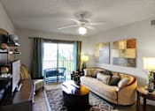 Thumbnail 12 of 21 - Living room at San Marco Apartments, Florida 32174