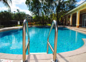 Thumbnail 6 of 13 - pool and seating at Sanctuary Cove, North Lauderdale, 33068