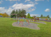 Thumbnail 20 of 28 - Apartments For Rent In Sherwood - Peaceful Park-Like Setting With Playground, Gazebo, And Bench.