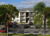 Thumbnail 3 of 18 - Community exterior and parking at Siesta Pointe, Hialeah, FL