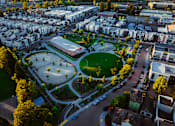 Thumbnail 79 of 81 - an aerial view of a city with houses and a park