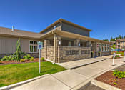 Thumbnail 9 of 26 - Front Entrance at SOUTH HILL BY VINTAGE, Puyallup