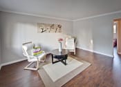 Thumbnail 4 of 26 - The Post Apartments living area with plank flooring at THE POST Apartments, California