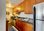 Thumbnail 16 of 26 - The Post Apartments kitchen area with stainless steel appliances at THE POST Apartments, PLEASANT HILL , California