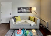 Thumbnail 3 of 26 - living area with ac unit at THE POST Apartments, California