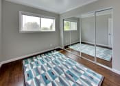 Thumbnail 19 of 26 - bedroom with mirrored closet doors at THE POST Apartments, PLEASANT HILL , CA