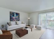 Thumbnail 2 of 18 - Living room with patio door