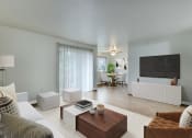 Thumbnail 3 of 18 - Living room with patio door