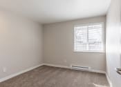 Thumbnail 12 of 31 - a bedroom with a window and carpet at Township Eastside, Portland, 97236