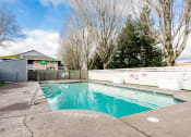 Thumbnail 23 of 31 - Apartments in Gresham OR - Township Eastside - Fenced-In Pool with Concrete Deck at Township Eastside, Oregon