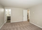 Thumbnail 18 of 31 - bedroom with bathroom and carpet at Township Eastside, Portland, OR, 06489