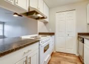 Thumbnail 4 of 46 - Kitchen view of stove area at TOWNSHIP Apartments, CANBY, OR