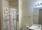 Thumbnail 12 of 14 - a bathroom with a shower toilet and sink at VINTAGE AT CITI VISTA, Reno, 89512