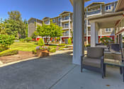 Thumbnail 13 of 21 - Patio Seating at VINTAGE AT HOLLY VILLAGE SENIORS Apartments, Everett, Washington, 98204