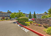 Thumbnail 4 of 21 - Entrance and sign at VINTAGE AT HOLLY VILLAGE SENIORS Apartments, Everett, WA, 98204