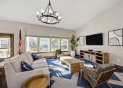Thumbnail 12 of 15 - Living Room With TV at VINTAGE AT SEVEN HILLS 55+ COMMUNITY, Henderson