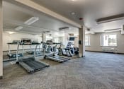 Thumbnail 12 of 17 - Workout in the Gym at VINTAGE AT TACOMA, Tacoma, WA, 98409