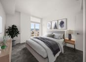 Thumbnail 7 of 9 - a bedroom with a bed and a window at Grand and Linden Family Apartments, South San Francisco, California
