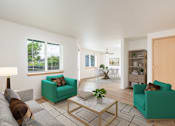 Thumbnail 3 of 37 - A living room with a green couch, a coffee table, and a lamp.at Vancouver Mall Apartments, Vancouver, WA