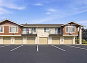 Thumbnail 45 of 47 - A large apartment complex with a parking lot in front.