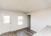 Thumbnail 21 of 33 - the living room of a new home with white walls and white doors