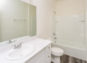 Thumbnail 8 of 32 - a bathroom with a sink toilet and a shower