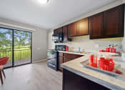 Thumbnail 6 of 40 - kitchen / outdoor balcony view