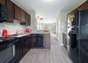 Thumbnail 19 of 40 - kitchen with plank flooring