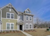 Thumbnail 19 of 19 - a large house with a blue sky in the background