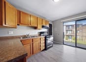 Thumbnail 20 of 40 - spacious kitchen with balcony