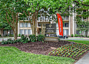 Thumbnail 66 of 66 - A sign in front of a building that says "Phi" on it.