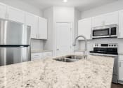 Thumbnail 8 of 28 - Blue Jay Commons Homes in Rincon, GA photo of kitchen