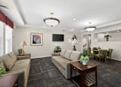 Thumbnail 20 of 32 - A living room with a grey carpet and furniture.