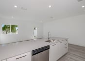 Thumbnail 9 of 23 - Pearl at Pompano Pompano Beach townhomes modern kitchen
