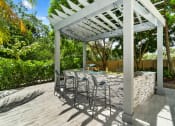 Thumbnail 10 of 13 - Wilton Tower apartments in Wilton Manors Florida photo of BBQ Grill and seating area