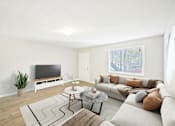 Thumbnail 6 of 20 - Living area in three bedroom apartment at Amber Grove with modern design and large windows