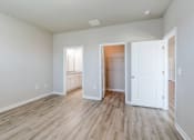 Thumbnail 8 of 62 - a renovated living room with white walls and wood floors