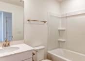 Thumbnail 17 of 45 - a bathroom with a sink and a shower and a toilet